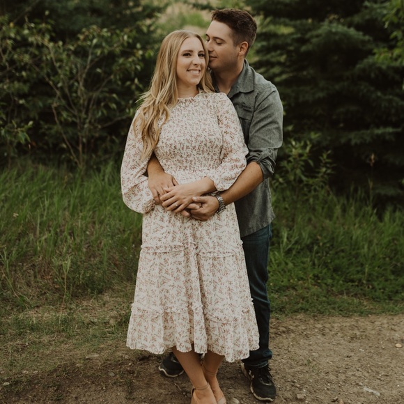 Cream midi dress with puff sleeves and smocked top. - Picture 1 of 2
